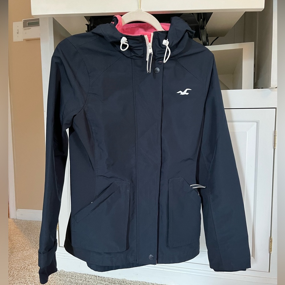 All weather jacket. Blue Navy and Pink. Size M, runs small.